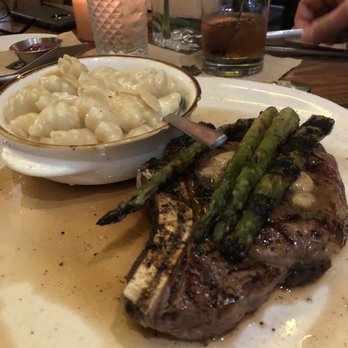 Timber Wood Fire Bistro - 16 oz. Iowa Premium Certified Angus Beef Bone-in Ribeye - Pizza Near Me - Omaha, Nebraska Timber Wood Fire Bistro - 16 oz. Iowa Premium Certified Angus Beef Bone-in Ribeye - Pizza Near Me - Omaha, Nebraska