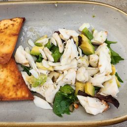 Crab and Avocado Salad.  Real crab with sprinkle of avocado and lettuce leaves.