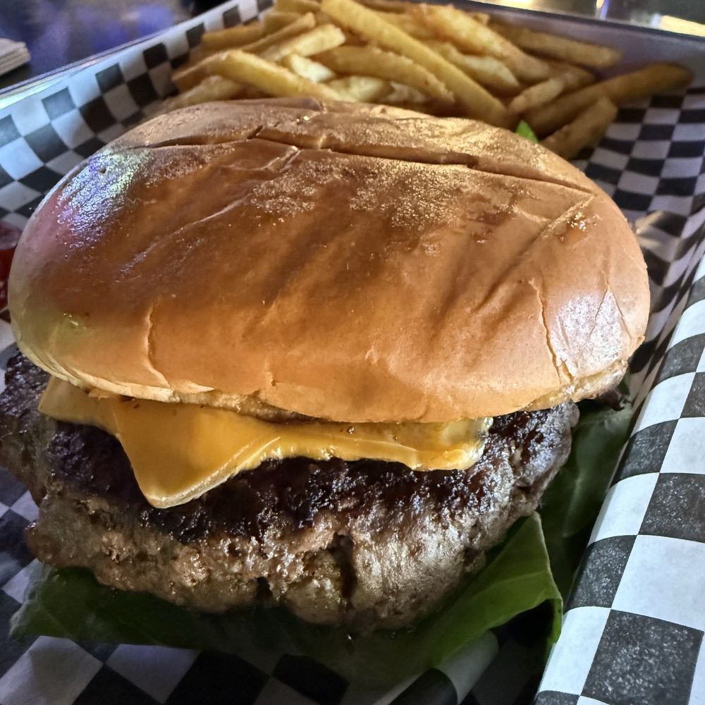 The Ivy Tavern - The Ivy 1/2 lb Cheeseburger. - Dive Bars Near Me - Dallas, Texas The Ivy Tavern - The Ivy 1/2 lb Cheeseburger. - Dive Bars Near Me - Dallas, Texas