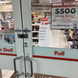 Shell - Got to love their sign!!! Garbage people in a garbage store I curse them and those who brought them into the world
