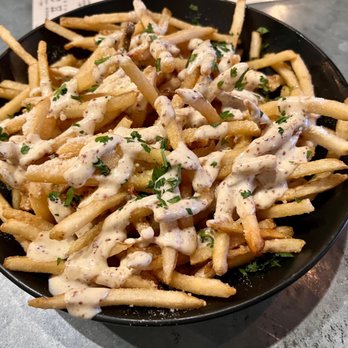 Down the Street - a bowl of french fries - Sports Bars Near Me - Houston, Texas