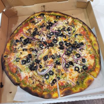 Upper Crust Pizzeria - This is totally burnt pizza I had received after waiting a ridiculously long 1 hour. Absolutely unacceptable. - Pizza Near Me - Beverly Hills, California