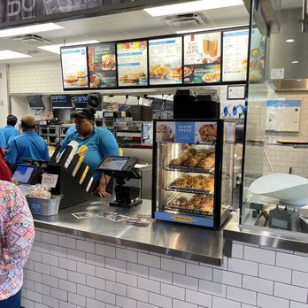 Biscuitville - a woman ordering food at a counter - Southern Near Me - Burlington, North Carolina