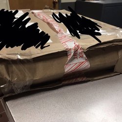 UPS Customer Center - Looks like roadkill...my computer in in here!!!