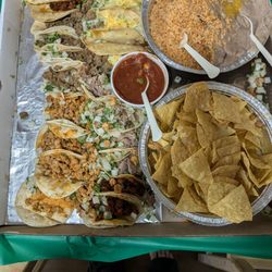 Aceituno’s Mexican Food - Carne Asada, Pollo and carnitas tacos platter with rice and beans. Plus chips and salsa.
