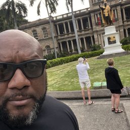Living out my fantasy next to the statue.