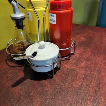 Shiba Pho -  table with condiments and condiments - Vietnamese Near Me - Brownsburg, Indiana