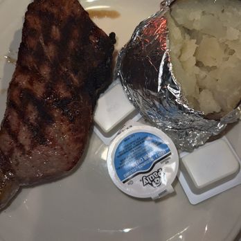Mancini's Char House - New York Strip with Baked Potato - Steakhouses Near Me - Saint Paul, Minnesota Mancini's Char House - New York Strip with Baked Potato - Steakhouses Near Me - Saint Paul, Minnesota