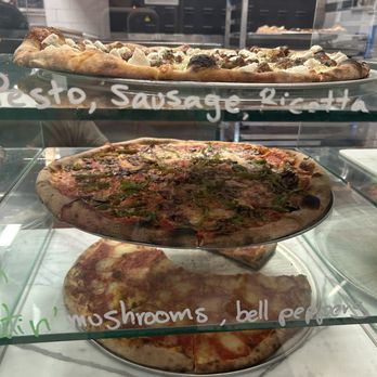 Forbidden Pizza - 3 pies on display when you walk in - Pizza Near Me - New Orleans, Louisiana