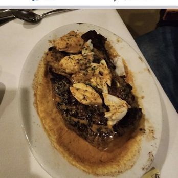 Ruth's Chris Steak House - a plate of food on a table - Steakhouses Near Me - Berlin, Maryland Ruth's Chris Steak House - a plate of food on a table - Steakhouses Near Me - Berlin, Maryland