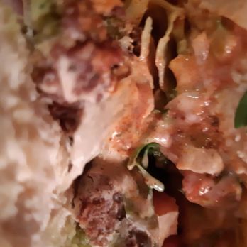 Shawarma Empire - The inside of my almost self-demolished falafel sandwich. - Middle Eastern Near Me - Scarborough, Ontario
