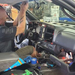 The Tech at Brad's installing the microphone for the Android Auto stereo.  Heck of a job and 5 stars!