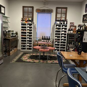 Grayton Corner Cafe - a table and chairs in a wine cellar - American Near Me - Santa Rosa Beach, Florida