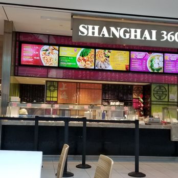 Shanghai 360 - a woman sitting at a table in a restaurant - Chinese Near Me - Toronto, Ontario Shanghai 360 - a woman sitting at a table in a restaurant - Chinese Near Me - Toronto, Ontario