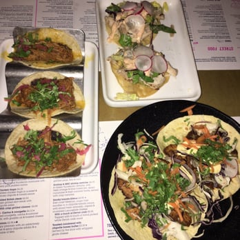 Wahaca - Pork pilbil taco, avocado chicken taquito and ancho chicken taco - Mexican Near Me - London, XGL Wahaca - Pork pilbil taco, avocado chicken taquito and ancho chicken taco - Mexican Near Me - London, XGL