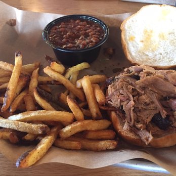 Mission BBQ - Pulled pork sandwich with baked beans and fries - Barbeque Near Me - Columbia, Maryland Mission BBQ - Pulled pork sandwich with baked beans and fries - Barbeque Near Me - Columbia, Maryland