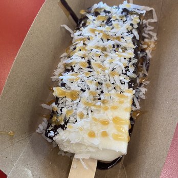 Monarca Gourmet Paletas - Coconut dipped in dark chocolate with coconut flakes and caramel drizzle. Delicious! - Ice Cream & Frozen Yogurt Near Me - Clive, Iowa