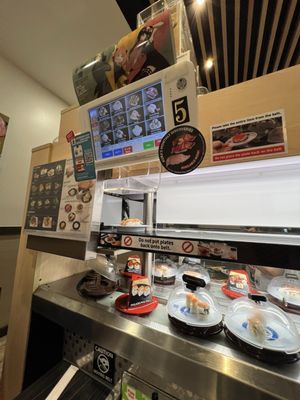 Kura Revolving Sushi Bar by null