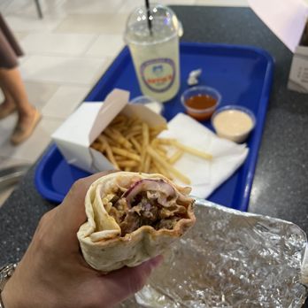 Artie's Express - a hand holding a sandwich - Fast Food Near Me - Glendale, California