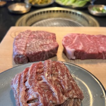 COTE Miami - Top left: dry aged ribeye Top right: American wagyu flatiron Bottom: kalbi - Korean Near Me - Miami, Florida COTE Miami - Top left: dry aged ribeye Top right: American wagyu flatiron Bottom: kalbi - Korean Near Me - Miami, Florida