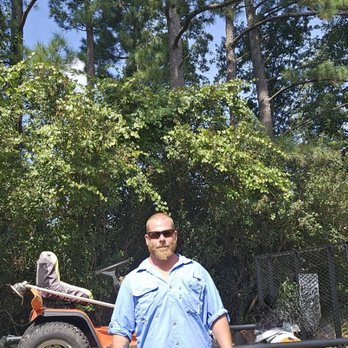 JK Outside Services - a man standing in front of a utility trailer - Landscape Architects or Designers Near Me JK Outside Services - a man standing in front of a utility trailer - Landscape Architects or Designers Near Me