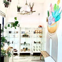 Wellness/healing goods including candles, incense, essential oils, natural organic home made teas