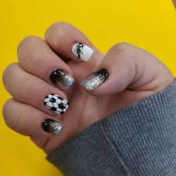 Prosperity Nails & Spa - Soccer ball accent nail, flaming soccer ball accent nail, and black & silver glitter ombre
