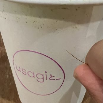 Usagi NY - Matcha with a piece of the plastic chasen i found from the drink - Bookstores Near Me - Dumbo, New York