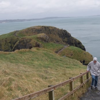 Carrick-a-rede Rope Bridge - Still going down the hill.. see how the path loops around! - Local Flavor Near Me - Ballintoy, ANT Carrick-a-rede Rope Bridge - Still going down the hill.. see how the path loops around! - Local Flavor Near Me - Ballintoy, ANT