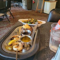The Shores - 8oz filet with crispy brussels and two grilled shrimp