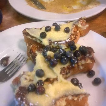 Half & Half - French toast with lemon curd and blueberries and biscuits and gravy...what's left of it at least.  Delicious! - Breakfast & Brunch Near Me - St. Louis, Missouri