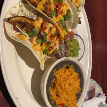 Bahama Breeze - Blackened Mahi Tacos : I chose beans and rice for my sides.  Super good. - Bars Near Me - Woodbridge, Virginia
