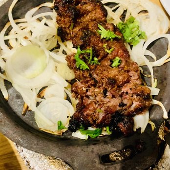 Karahi Point - a plate of meat and onions - Indian Near Me - Mississauga, Ontario