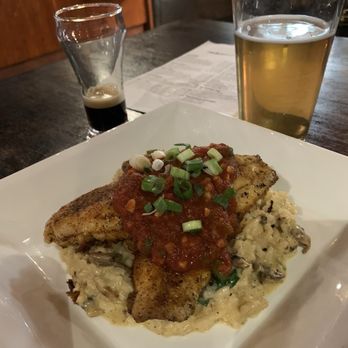 Redwood Steakhouse & Brewery - Red snapper blackened over a bed of spinach and mushroom risotto. German style Kolsch very nice and a sampling of Imperial Russian Stout.. - New American Near Me - Flint, Michigan