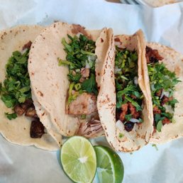 Lengua, carnitas, al pastor, and chorizo tacos Lengua, carnitas, al pastor, and chorizo tacos