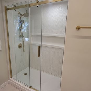 San Diego Construction - a bathroom with a shower and a window - General Contractors Near Me