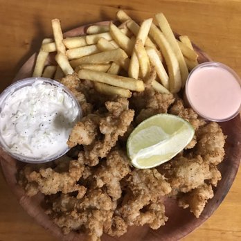 Fish Shack - Cracked conch platter for $18.95. It's huge and delicious if you like fried calamari type food. - Seafood Near Me - Lighthouse Point, Florida Fish Shack - Cracked conch platter for $18.95. It's huge and delicious if you like fried calamari type food. - Seafood Near Me - Lighthouse Point, Florida