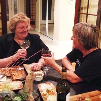 Passmore - two women sharing a glass of wine - Specialty Food Near Me - Sloughhouse, California Passmore - two women sharing a glass of wine - Specialty Food Near Me - Sloughhouse, California