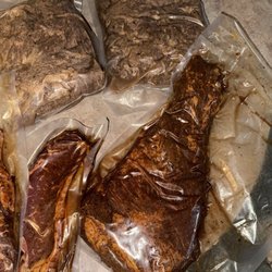 Ramey's Meats - 2 packages of carne up top, marinated steaks on the left, and the big boy tri tip on the right.