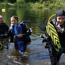 Adventure Divers - Instructor Randy Timms with students diving in Marmora, Ontario.