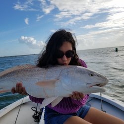 Tug of War Charters - Kissing her first big red