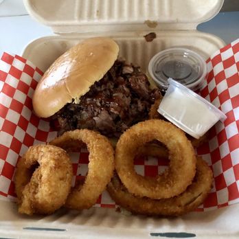 Biggs’ BBQ - Bbq brisket sandwich with side onion rings - Barbeque Near Me - Lemoore, California