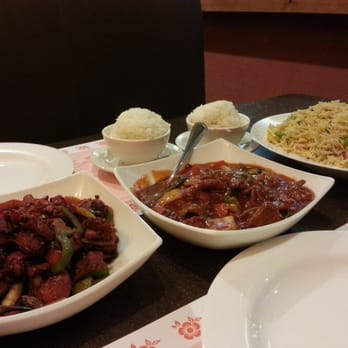 Royal Jasmine - Left to right: tandoori chicken, schezwan beef, and shrimp friend rice. - Asian Fusion Near Me - Mississauga, Ontario