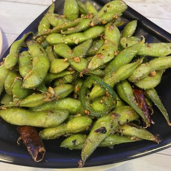 Sushi Ryokan - Spicy Edamame - delicious with just enough heat and deliciously crispy garlic. - Sushi Bars Near Me - Seal Beach, California Sushi Ryokan - Spicy Edamame - delicious with just enough heat and deliciously crispy garlic. - Sushi Bars Near Me - Seal Beach, California