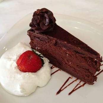Circles Bistro - Triple chocolate flourless torte. - New American Near Me - Tampa, Florida Circles Bistro - Triple chocolate flourless torte. - New American Near Me - Tampa, Florida