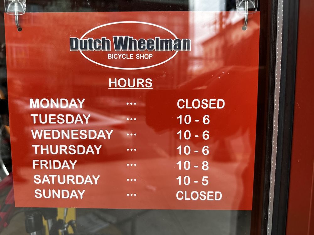 Dutch Wheelman Bicycle Shop Logo