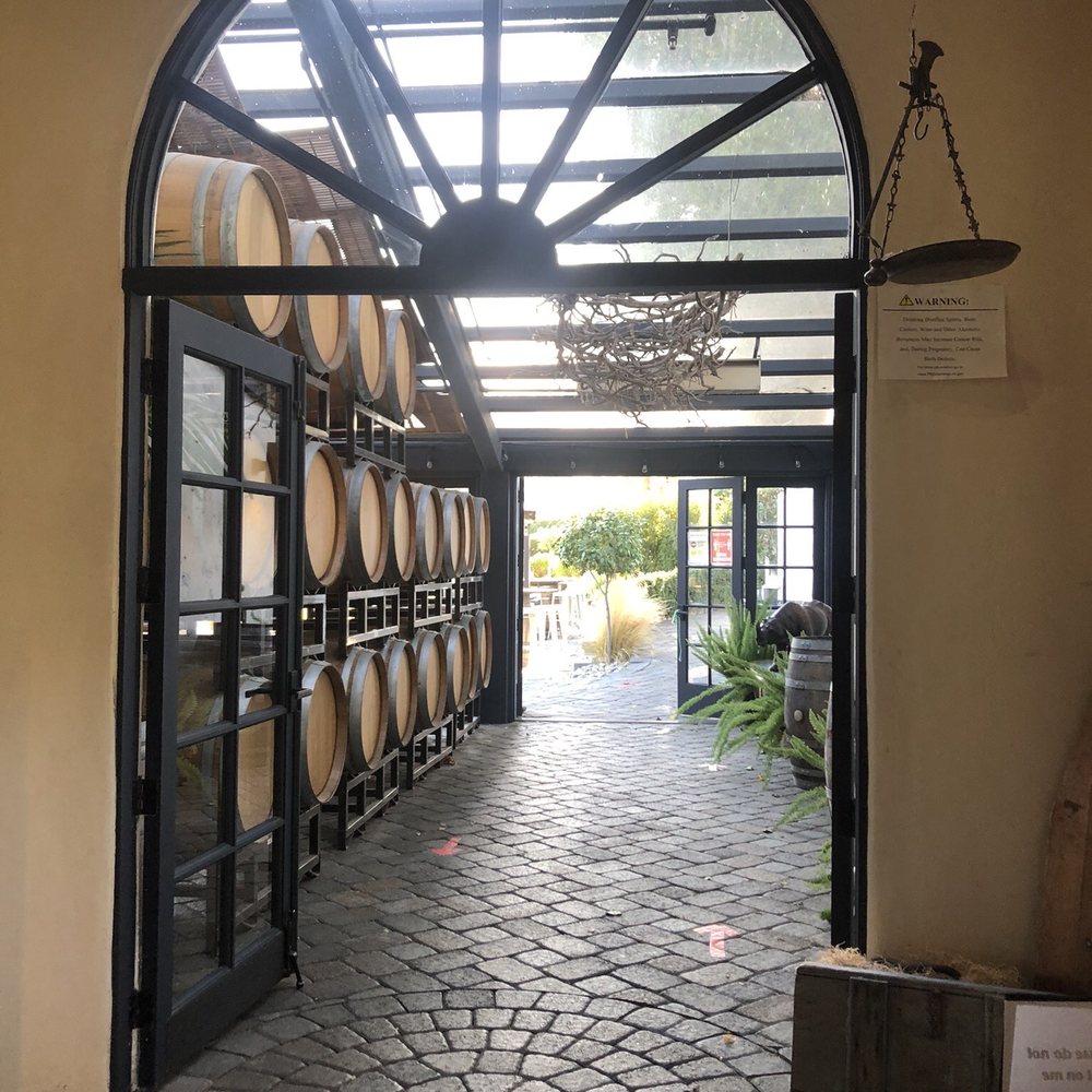 Folktale Winery - Arrows to keep crowds in check as you walk into the garden - Wineries Near Me - Carmel, California Folktale Winery - Arrows to keep crowds in check as you walk into the garden - Wineries Near Me - Carmel, California