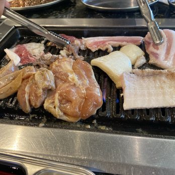 Buga Korean BBQ - Cooking meat and mushrooms and onions - Barbeque Near Me - San Diego, California