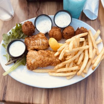 Down Under Restaurant - Fish & Chips with a side of Hush puppies - Seafood Near Me - Fernandina Beach, Florida Down Under Restaurant - Fish & Chips with a side of Hush puppies - Seafood Near Me - Fernandina Beach, Florida