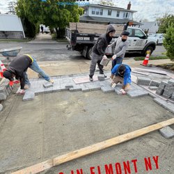 Smart General Contracting - Laying down pavers in Elmont Newyork